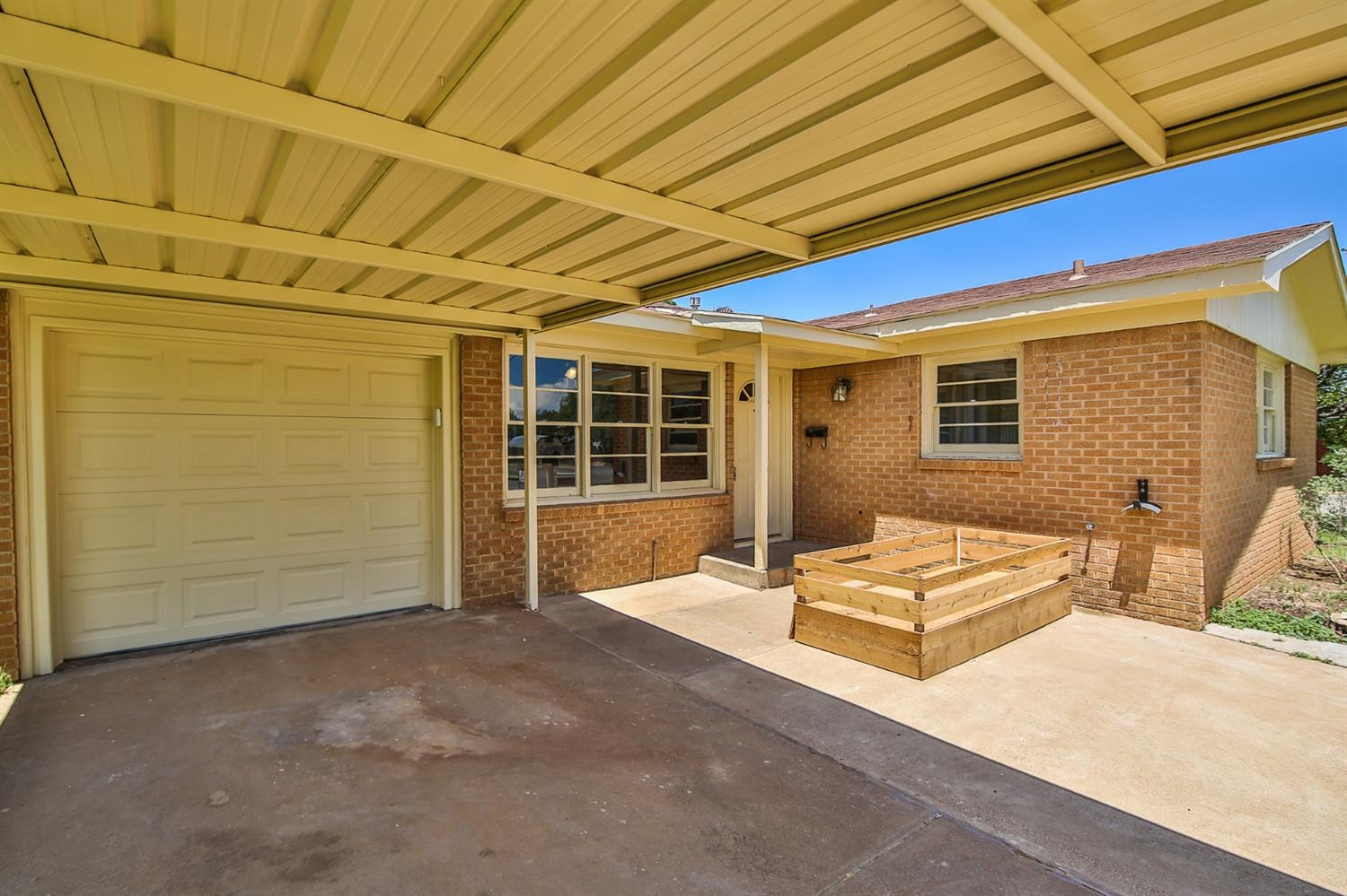 5002 43rd Street Lubbock, TX 79414 - Photo 3 of 10 a backyard of a house with seating space