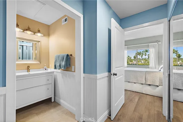 a bathroom with sink and mirror