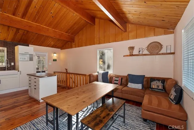 a outdoor living space with furniture and wooden floor