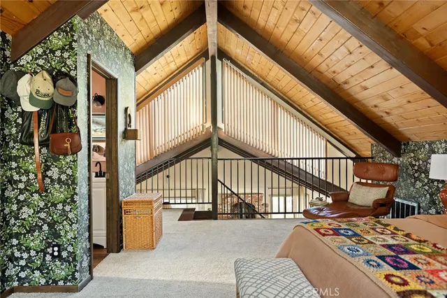 a view of balcony with wooden floor and outdoor seating