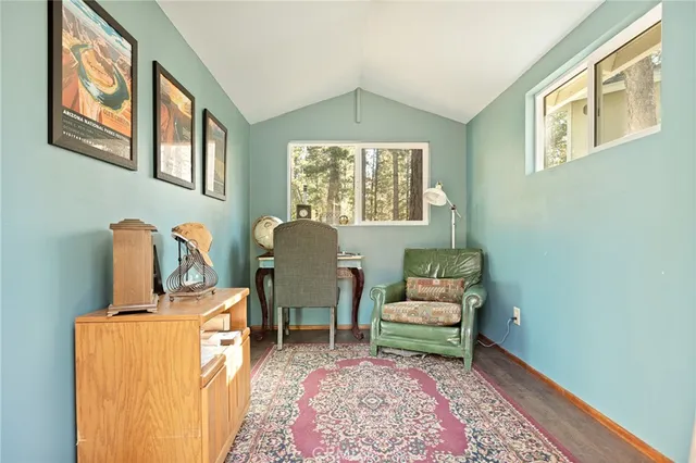 front view of a house with a fence