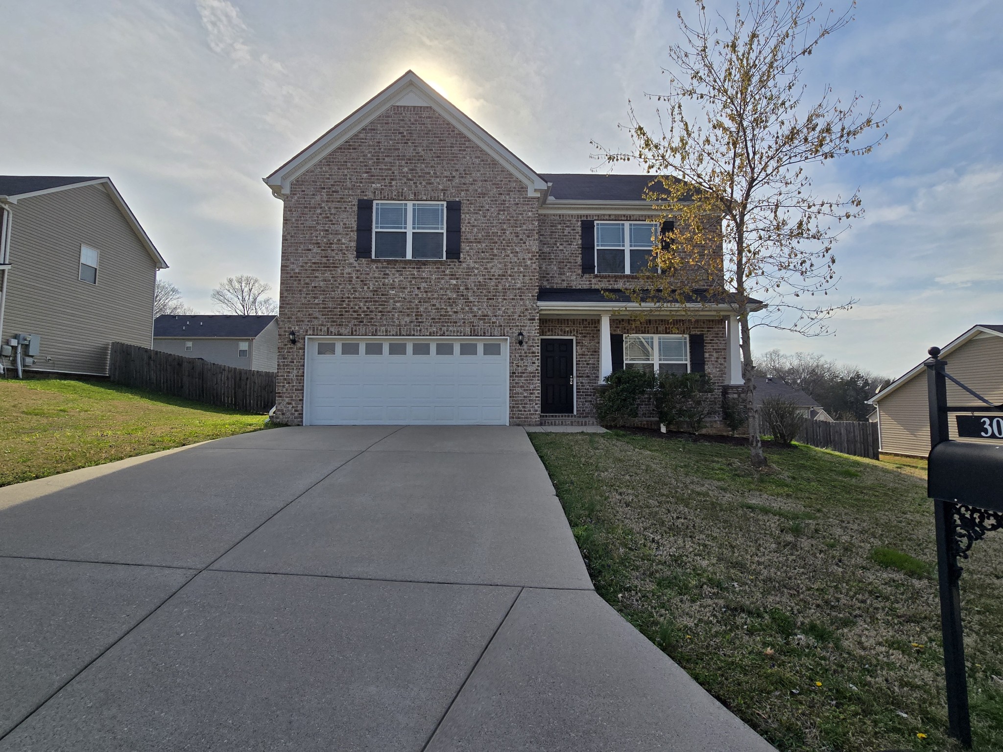 3003 Dove Court Spring Hill, TN 37174 - Photo 1 of 23 a front view of a house with a yard