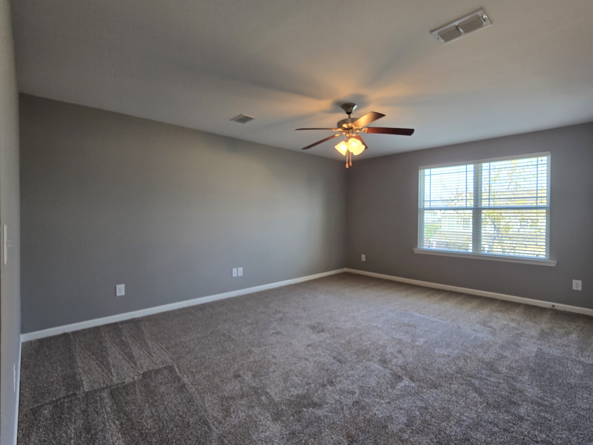 3003 Dove Court Spring Hill, TN 37174 - Photo 12 of 23 an empty room with fan and windows