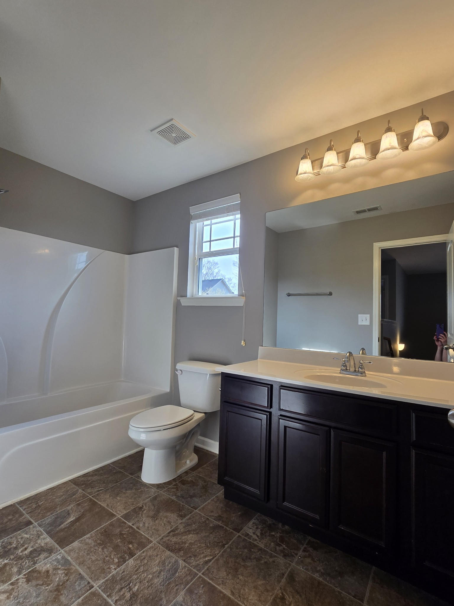3003 Dove Court Spring Hill, TN 37174 - Photo 15 of 23 a bathroom with a sink and a mirror