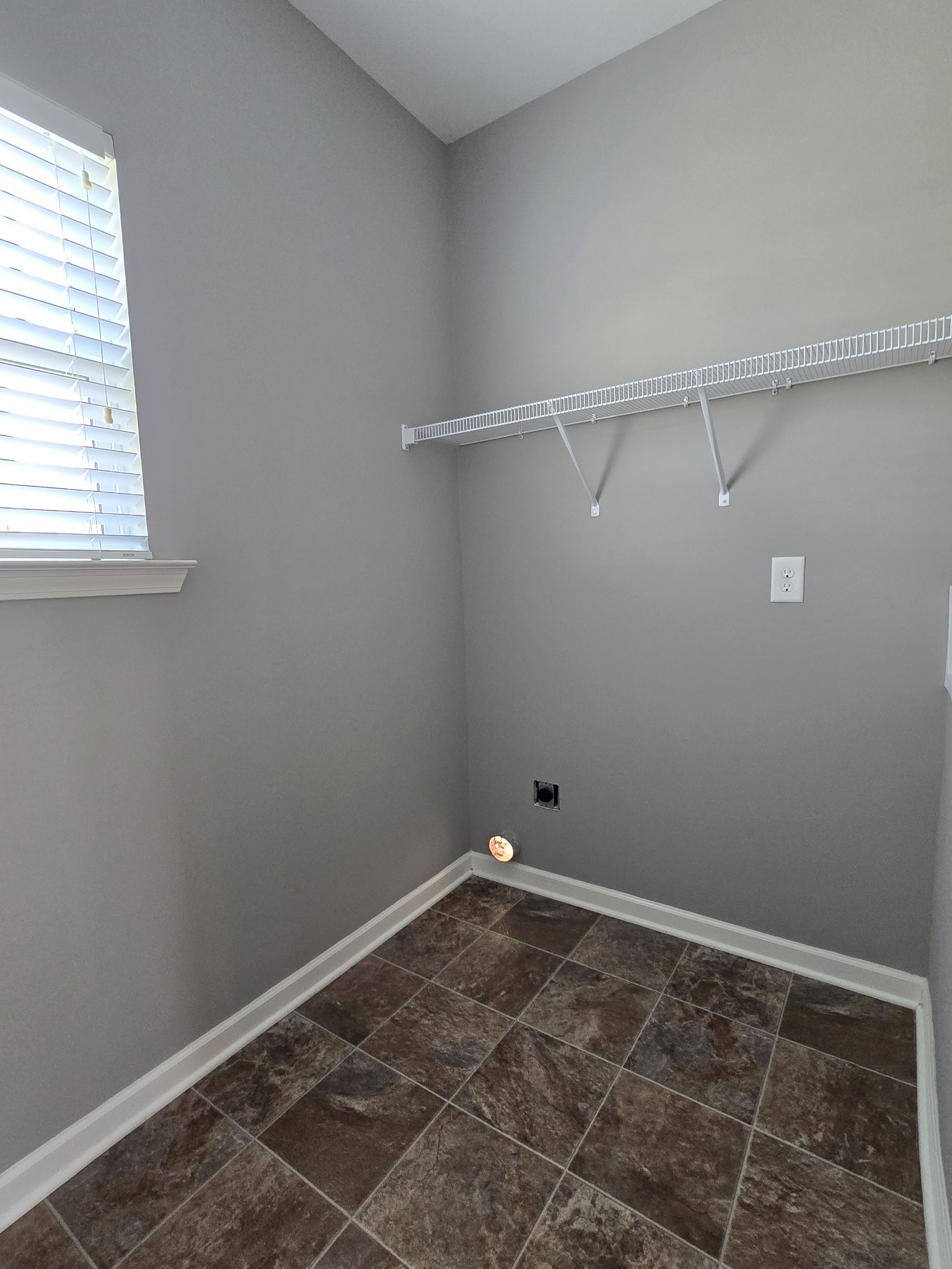 3003 Dove Court Spring Hill, TN 37174 - Photo 20 of 23 a view of a room with racks on the wall