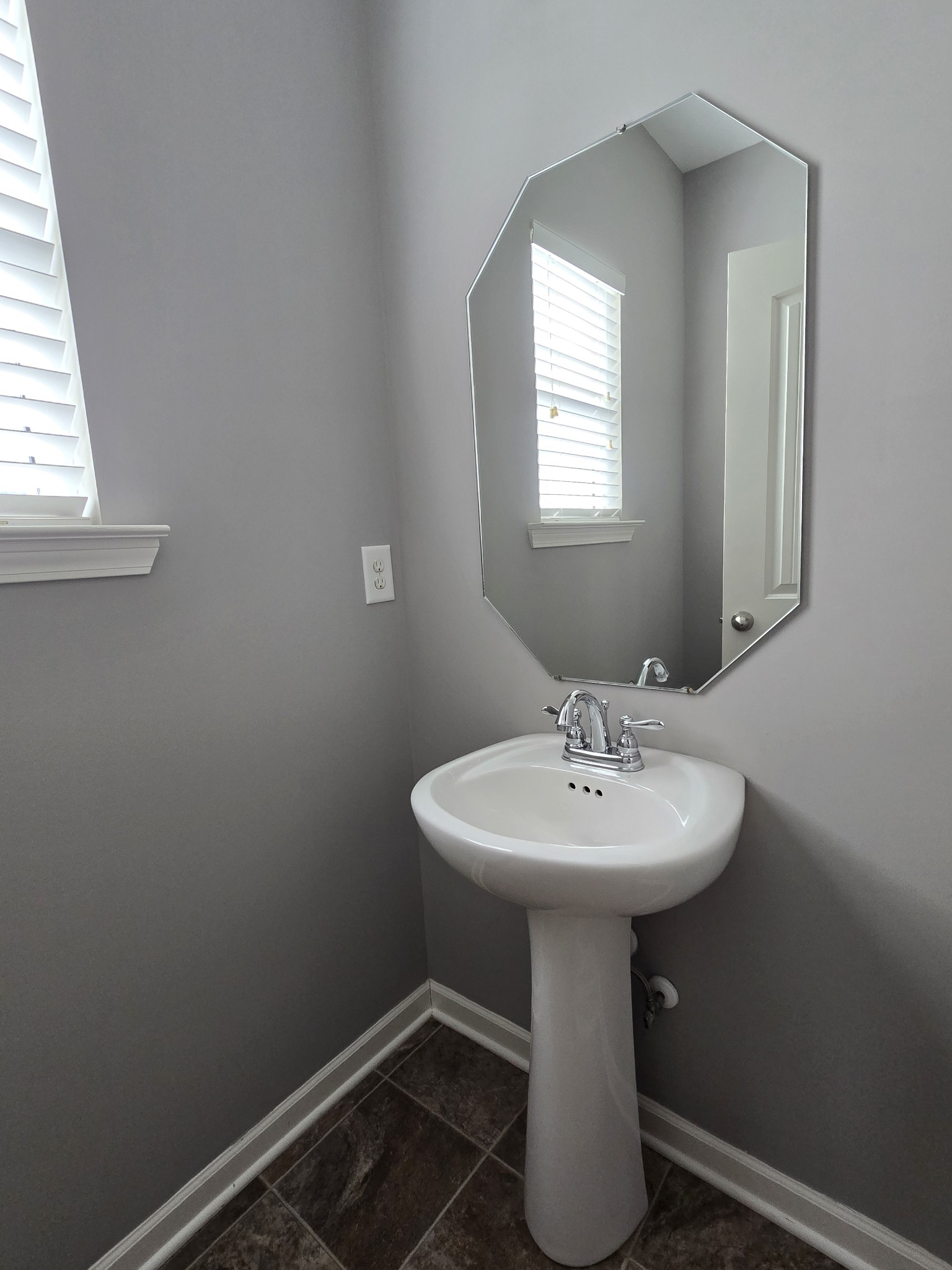 3003 Dove Court Spring Hill, TN 37174 - Photo 21 of 23 a bathroom with a sink toilet and mirror
