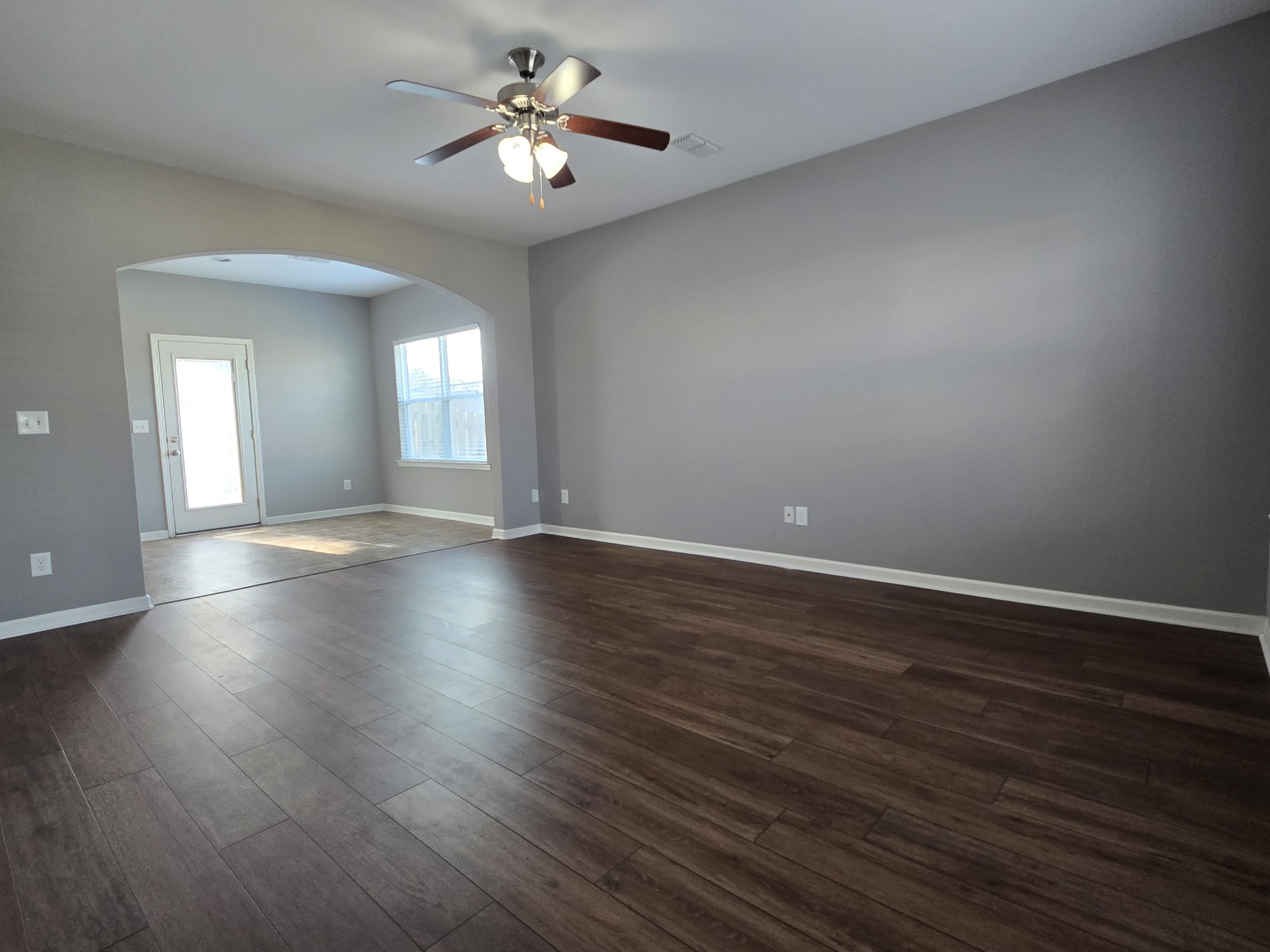 3003 Dove Court Spring Hill, TN 37174 - Photo 4 of 23 a view of empty room with wooden floor and fan