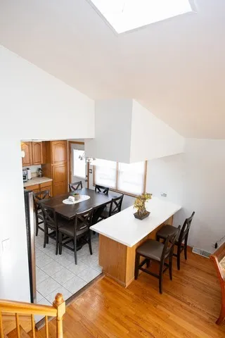 a workspace with furniture and wooden floor