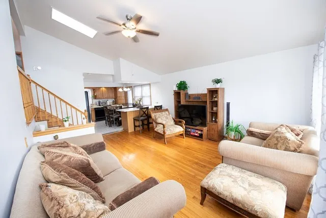 a living room with furniture or couch and a fireplace