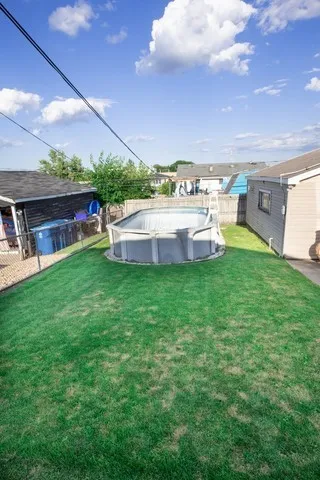 a view of a house with a yard porch and sitting area