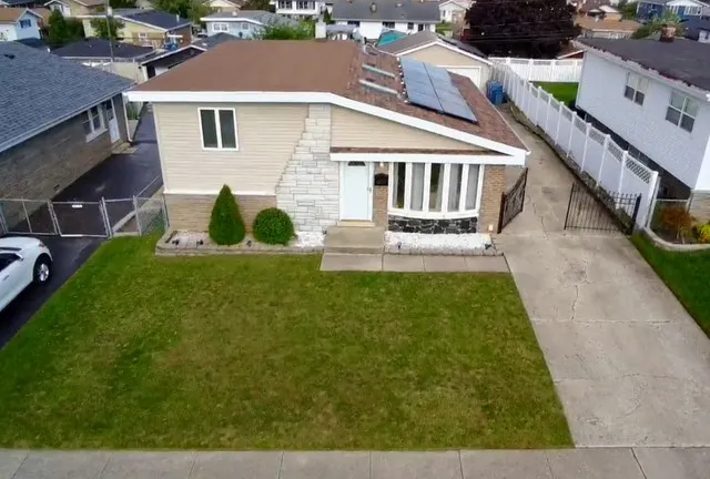 front view of house with a yard