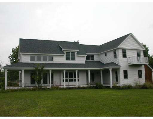 481 Hill Road Boxborough, MA 01719 - Photo 2 of 13 a front view of a house with a garden