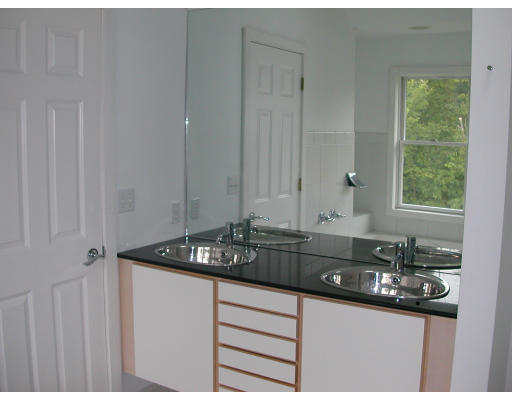 481 Hill Road Boxborough, MA 01719 - Photo 8 of 13 a bathroom with a sink and a mirror