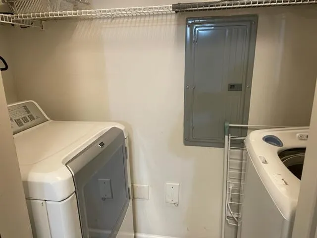 a utility room with dryer and washer