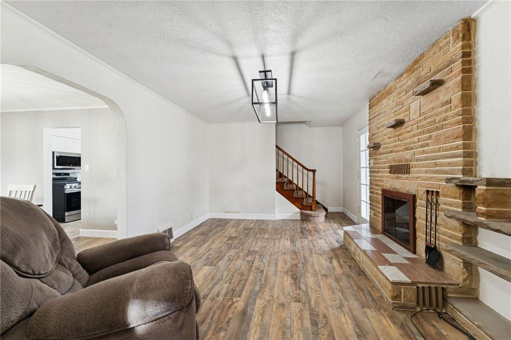 1200 Summerset Drive McKeesport, PA 15135 - Photo 6 of 27 a bedroom with furniture and a fireplace