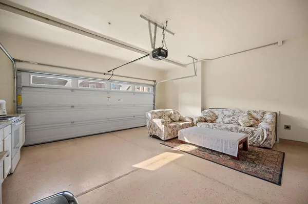 a bedroom with bed and window