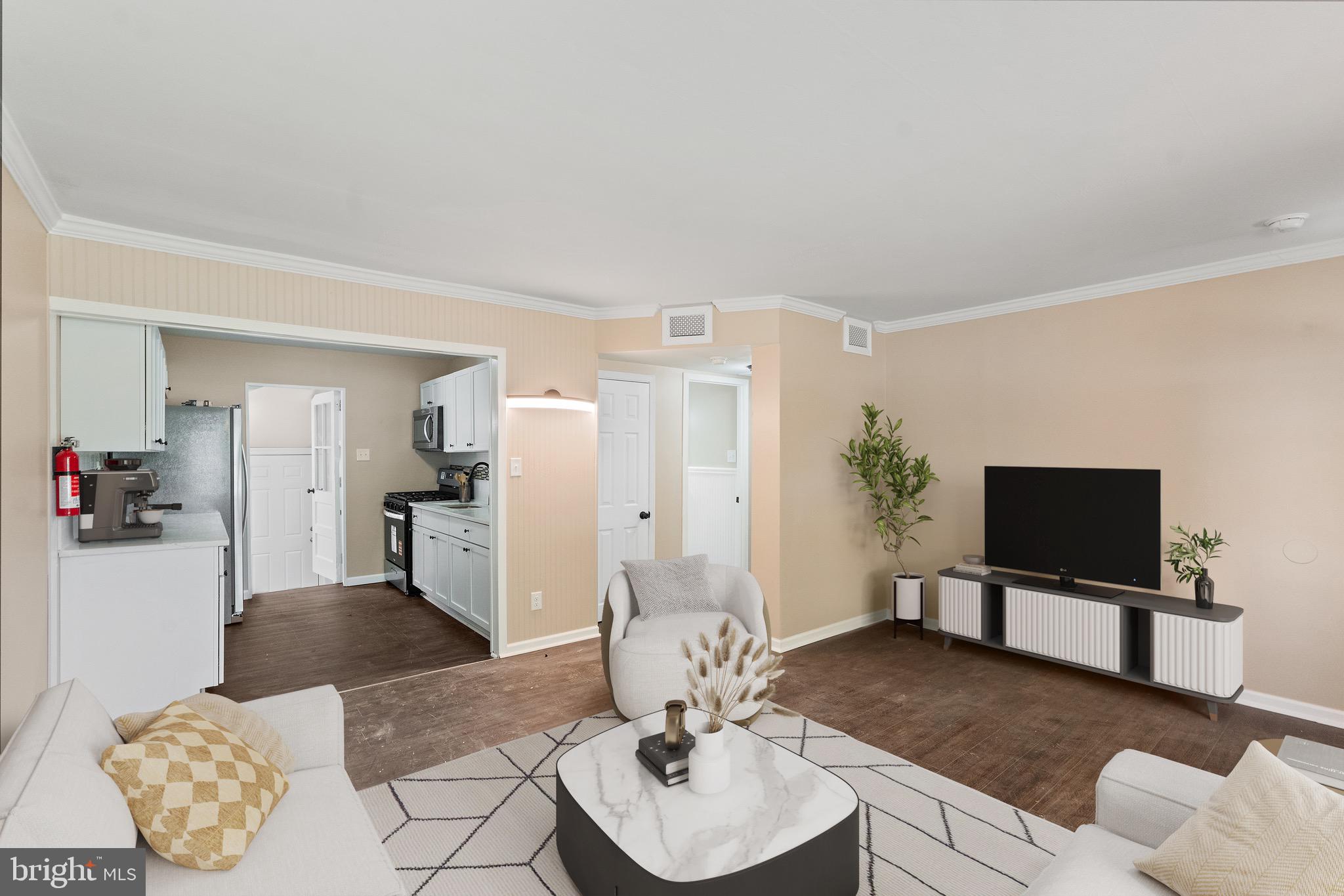 4 West Germantown Avenue Maple Shade, NJ 08052 - Photo 11 of 29 a living room with furniture and a flat screen tv