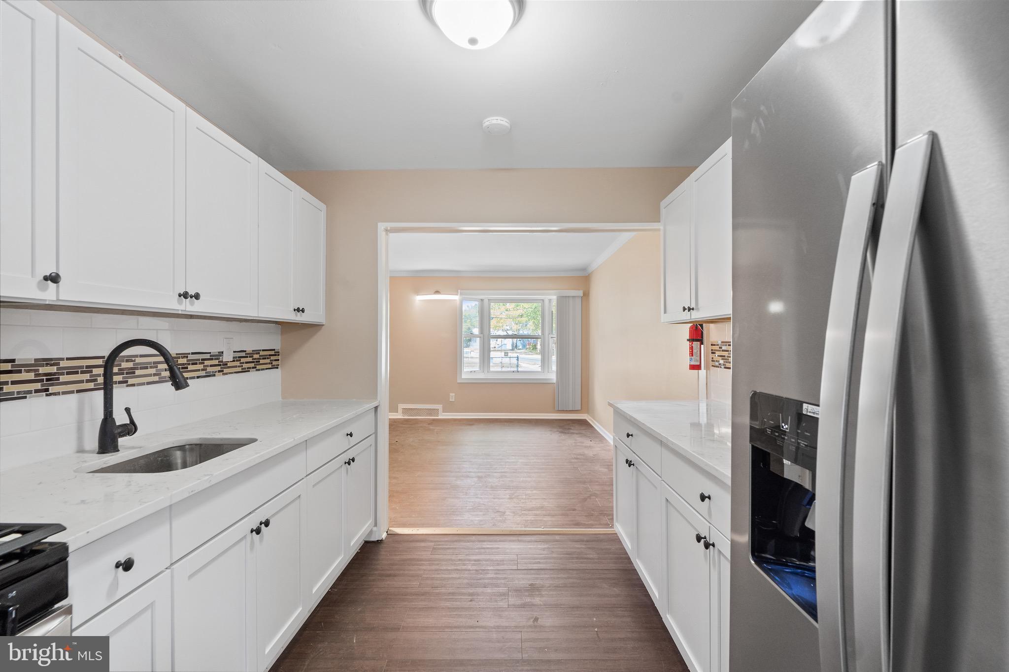 4 West Germantown Avenue Maple Shade, NJ 08052 - Photo 13 of 29 a spacious bathroom with a sink and a mirror