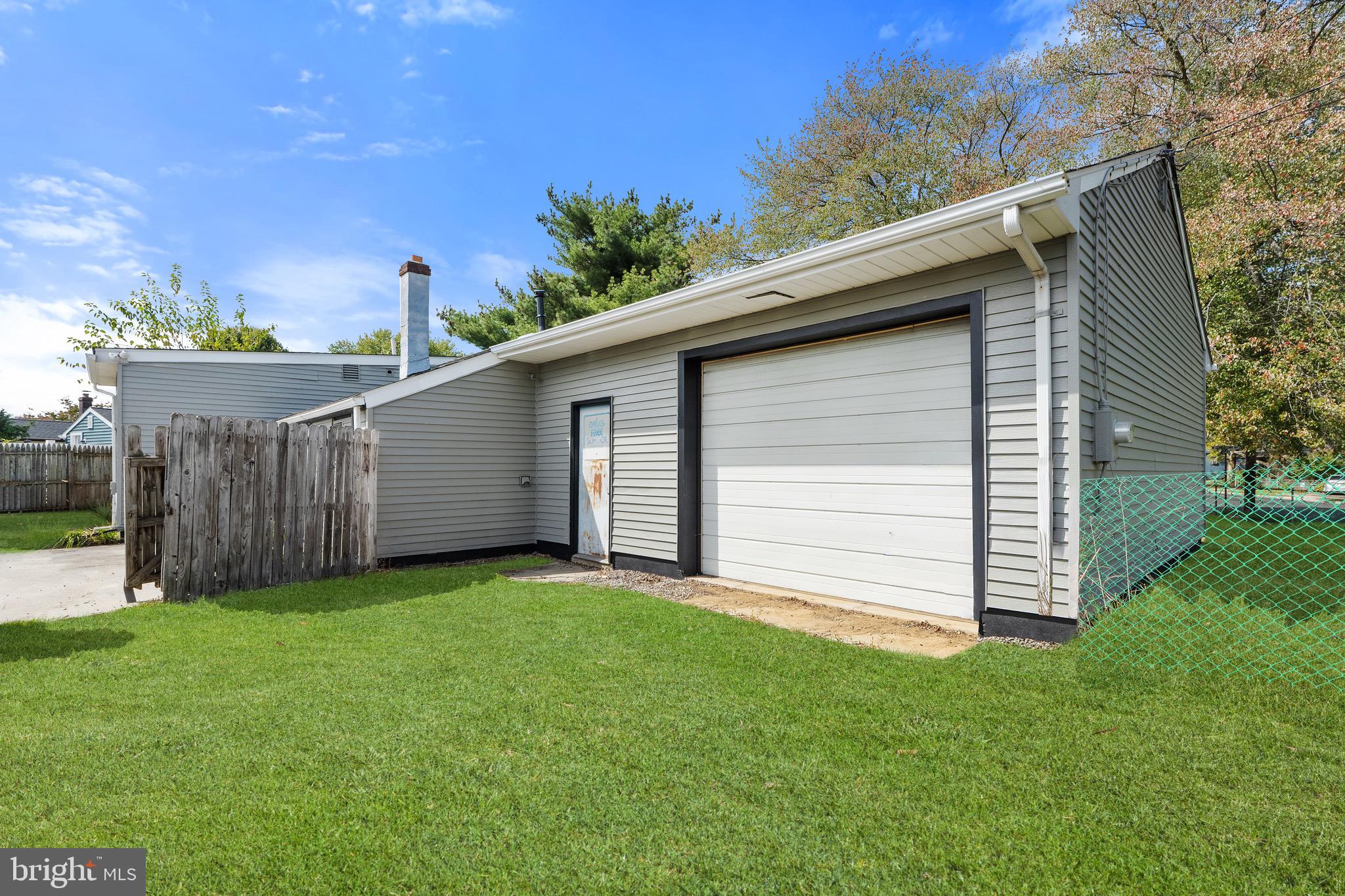 4 West Germantown Avenue Maple Shade, NJ 08052 - Photo 26 of 29 a backyard of a house with lots of green space