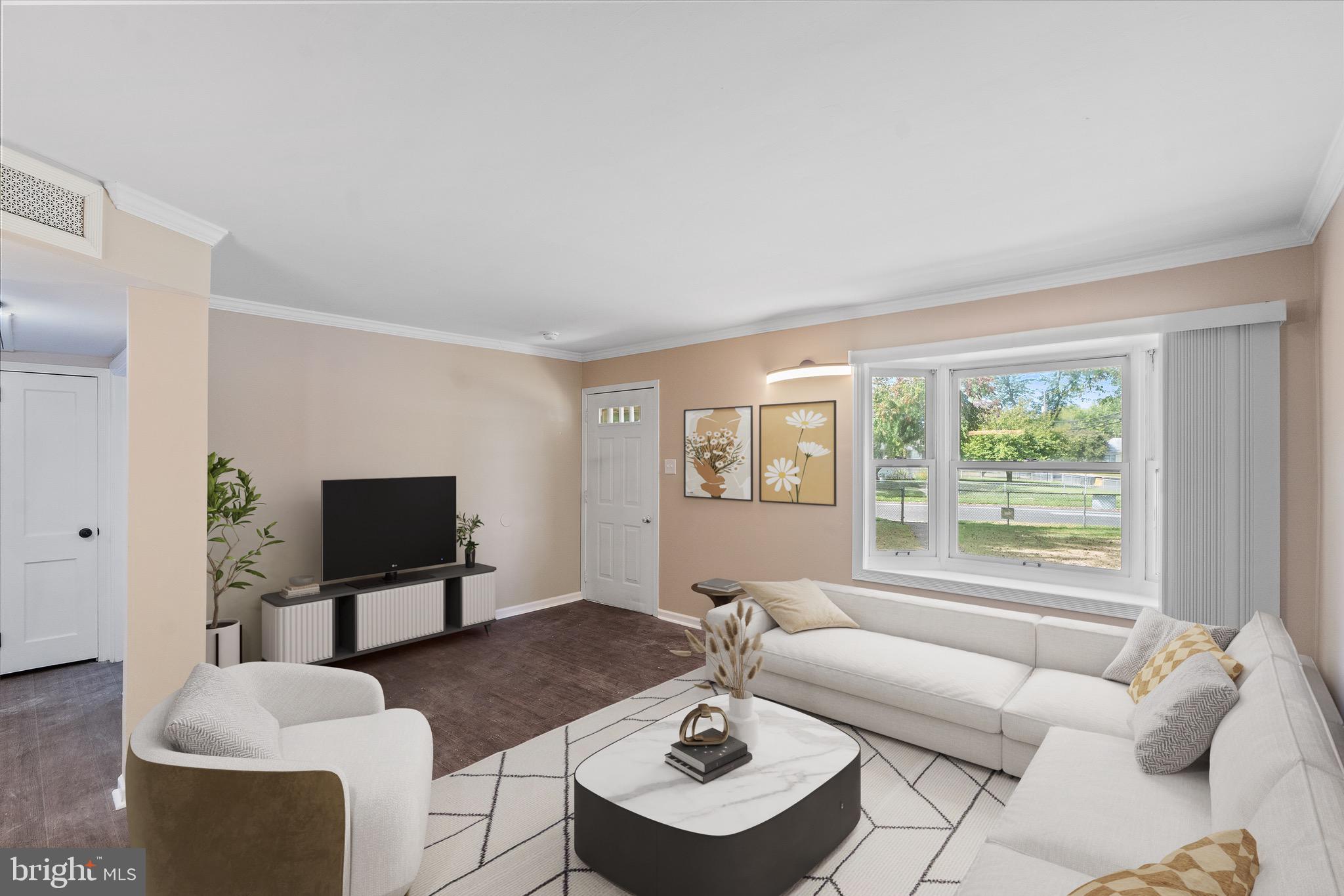 4 West Germantown Avenue Maple Shade, NJ 08052 - Photo 9 of 29 a living room with furniture and a flat screen tv