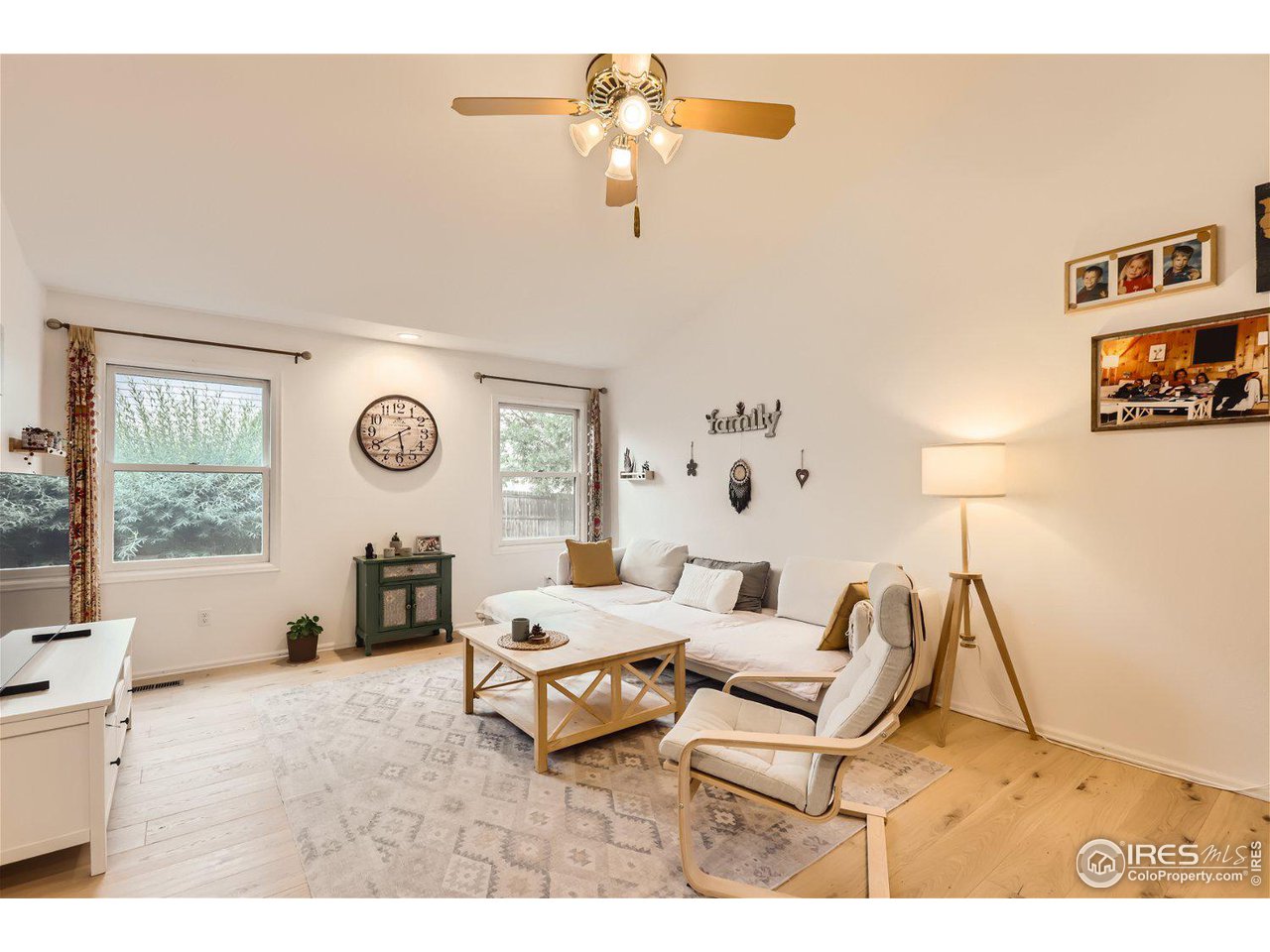 6301 Victoria Road Fort Collins, CO 80525 - Photo 9 of 16 a living room with furniture and a window