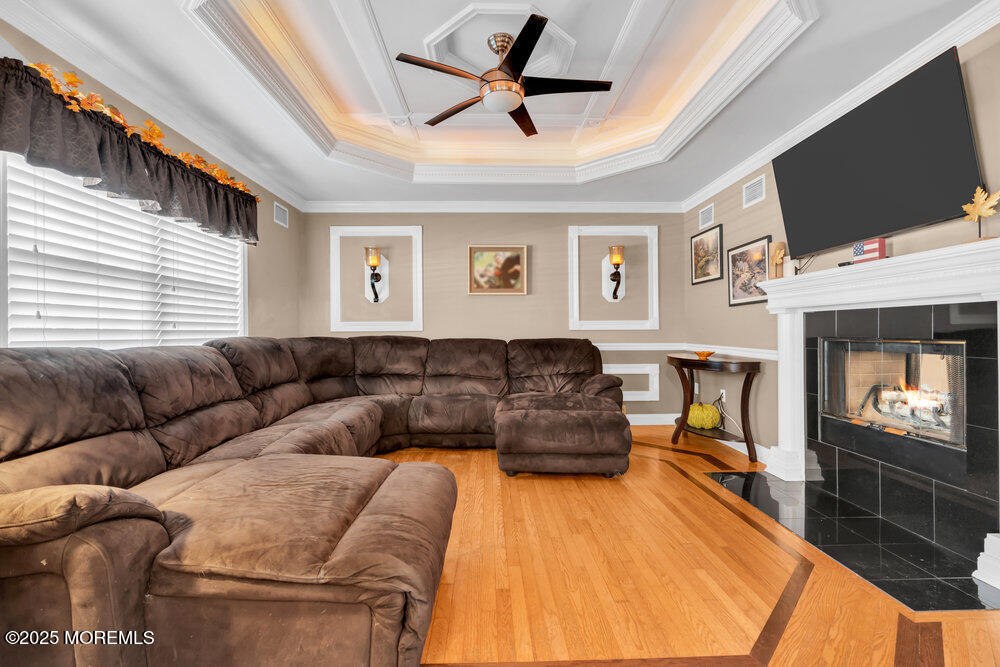 117 South Cooks Bridge Road Jackson, NJ 08527 - Photo 15 of 48 a living room with furniture and a flat screen tv