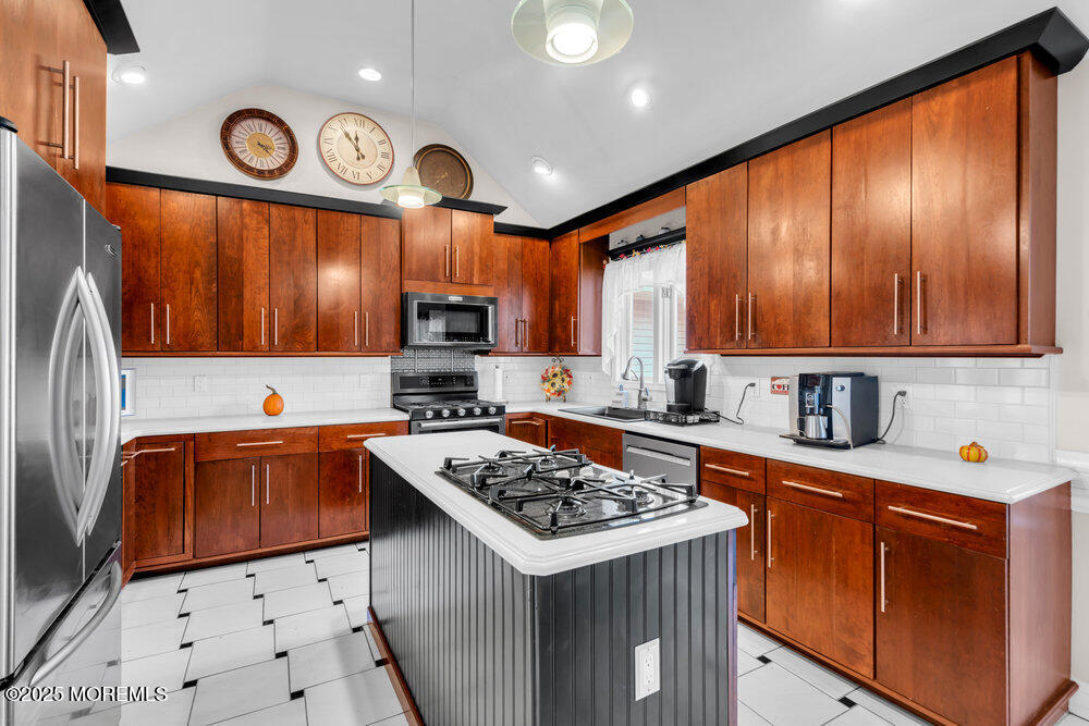 117 South Cooks Bridge Road Jackson, NJ 08527 - Photo 19 of 48 a kitchen with stainless steel appliances granite countertop a sink stove and refrigerator