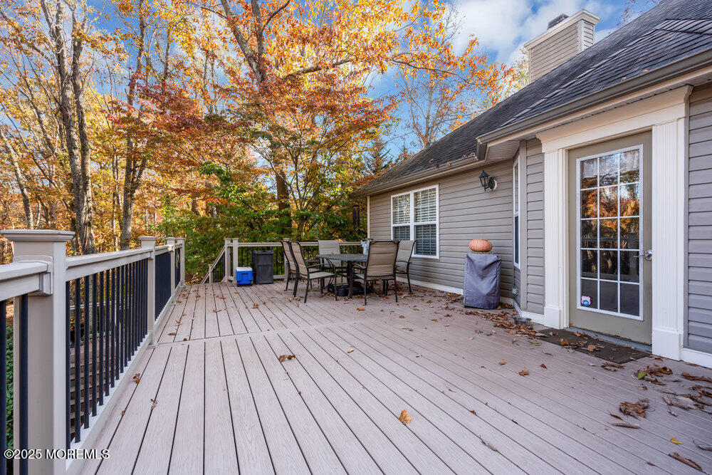 117 South Cooks Bridge Road Jackson, NJ 08527 - Photo 25 of 48 a view of house with deck outdoor seating and wooden floor