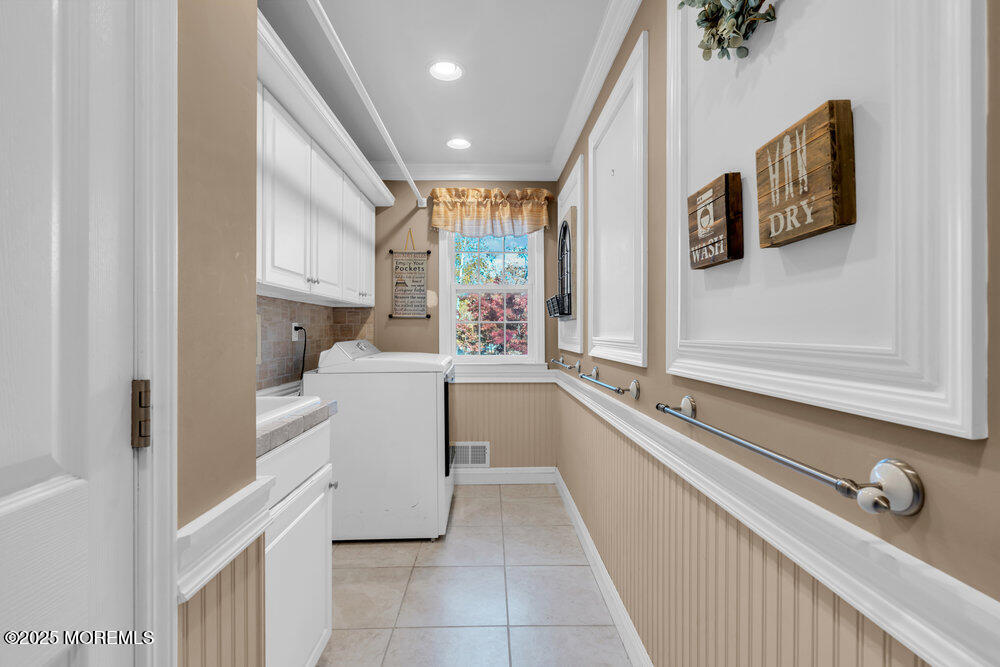 117 South Cooks Bridge Road Jackson, NJ 08527 - Photo 28 of 48 a kitchen with a refrigerator and a sink