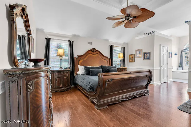 a bathroom with a tub and a window