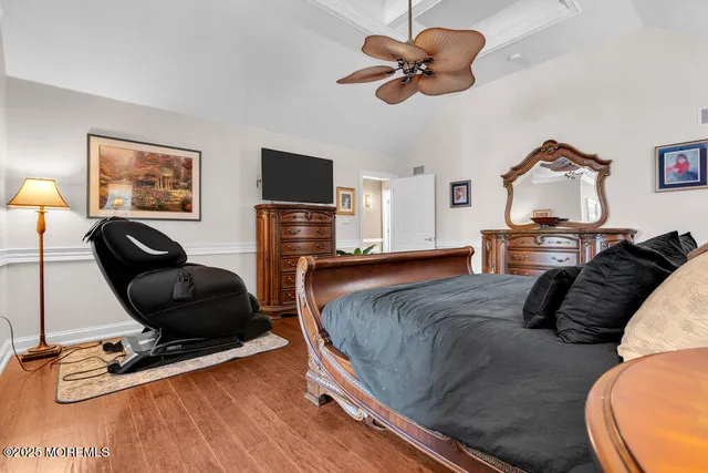 a bath room with a granite countertop sink and a window