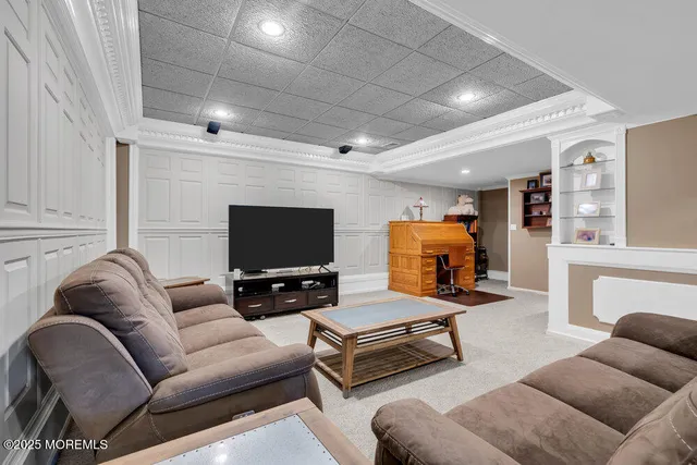 a spacious bedroom with a bed and a mirror