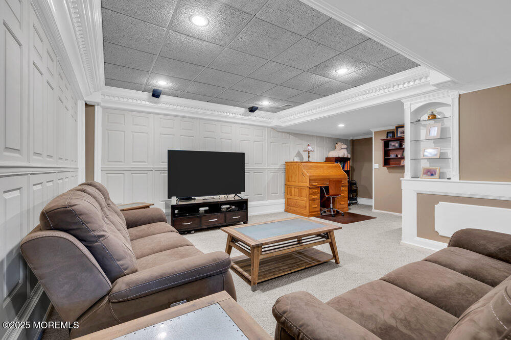 117 South Cooks Bridge Road Jackson, NJ 08527 - Photo 38 of 48 a living room with furniture and a flat screen tv