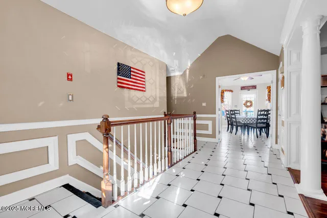 a view of a dining room with furniture and a fireplace