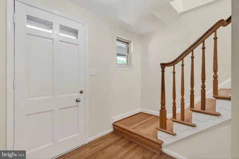 a view of a hallway with staircase
