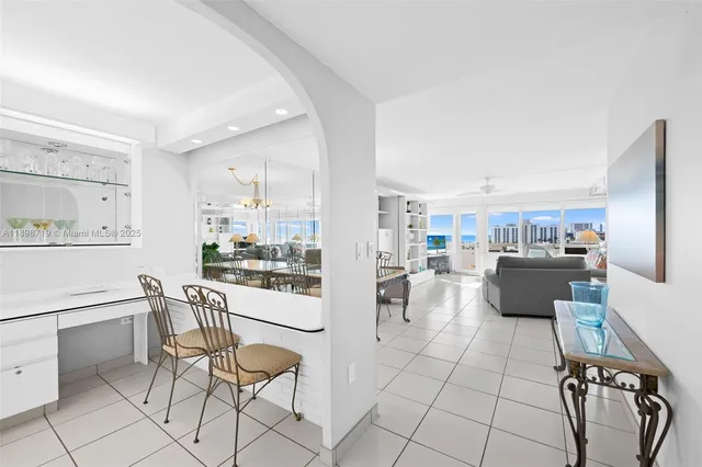 a kitchen with a table and chairs
