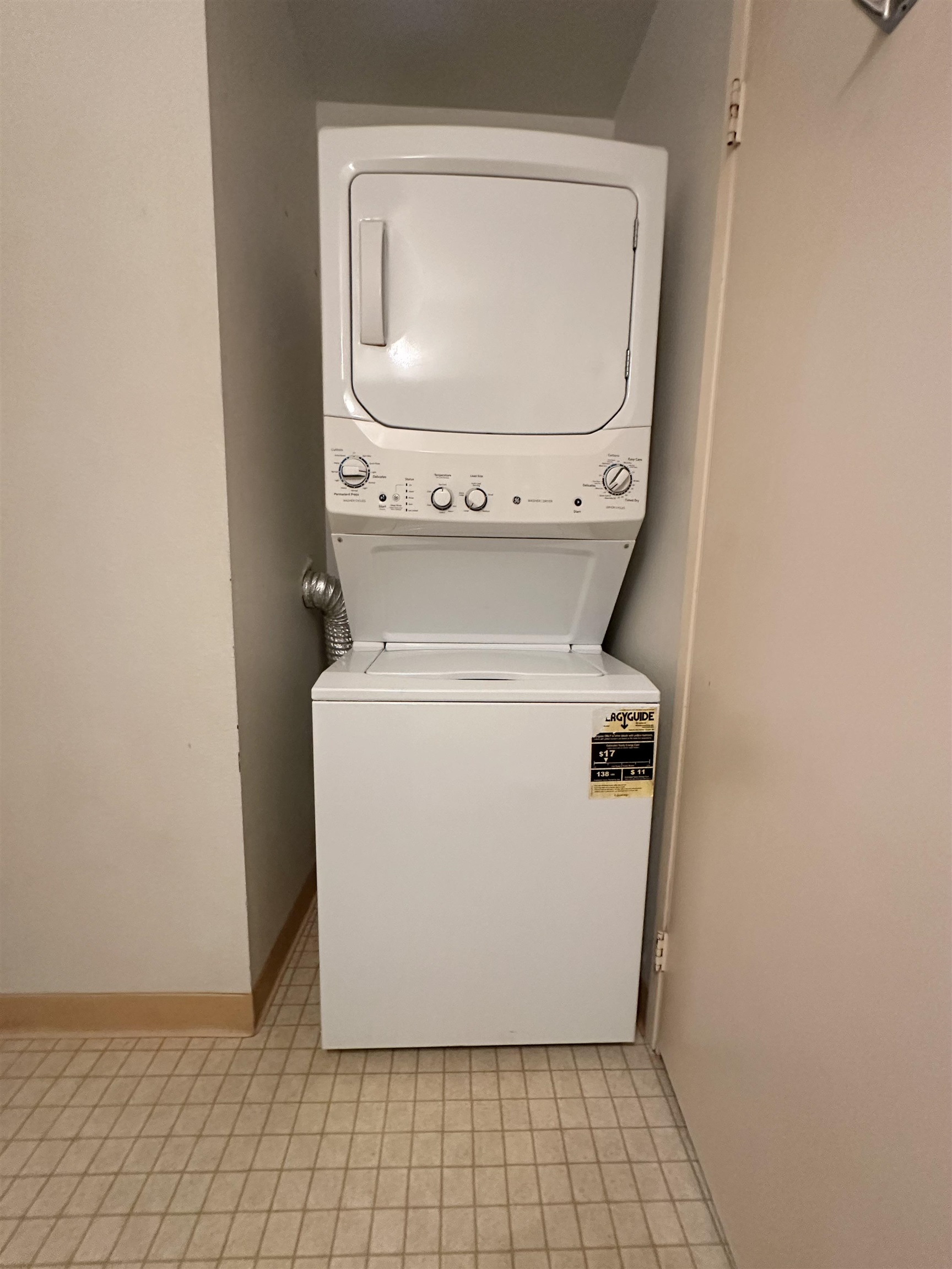 140 Uwapo Road, Unit 33201 Kihei, HI 96753 - Photo 10 of 13 a utility room with dryer and washer