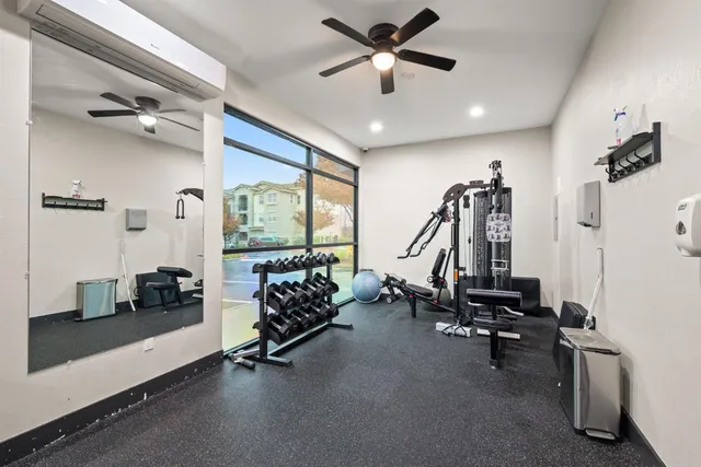 a view of a room with gym equipment