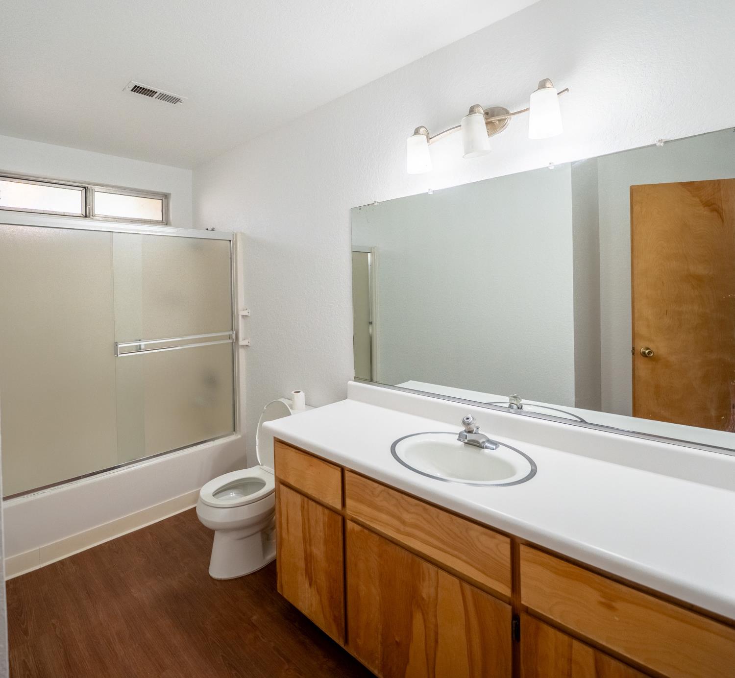494 Surrey Court Murphys, CA 95247 - Photo 40 of 76 a bathroom with a sink a toilet and shower