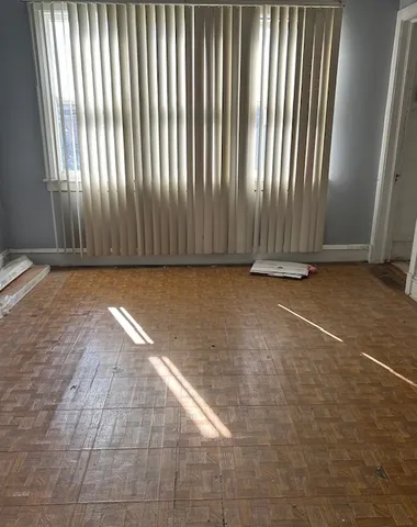 an empty room with windows