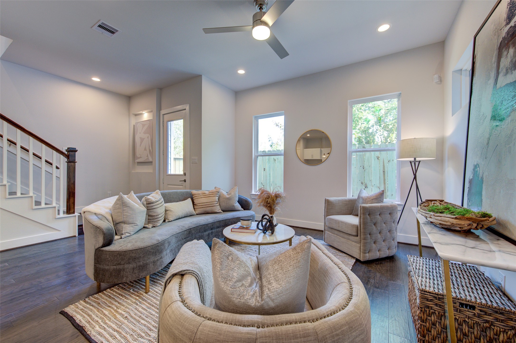 853 Mansfield Street, Unit A Houston, TX 77091 - Photo 1 of 16 a living room with furniture and a large mirror