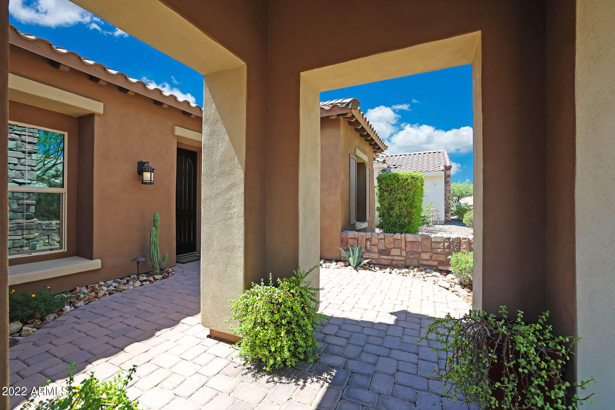 18333 West Desert Trumpet Road Goodyear, AZ 85338 - Photo 7 of 124 Pavered Courtyard and Driveway