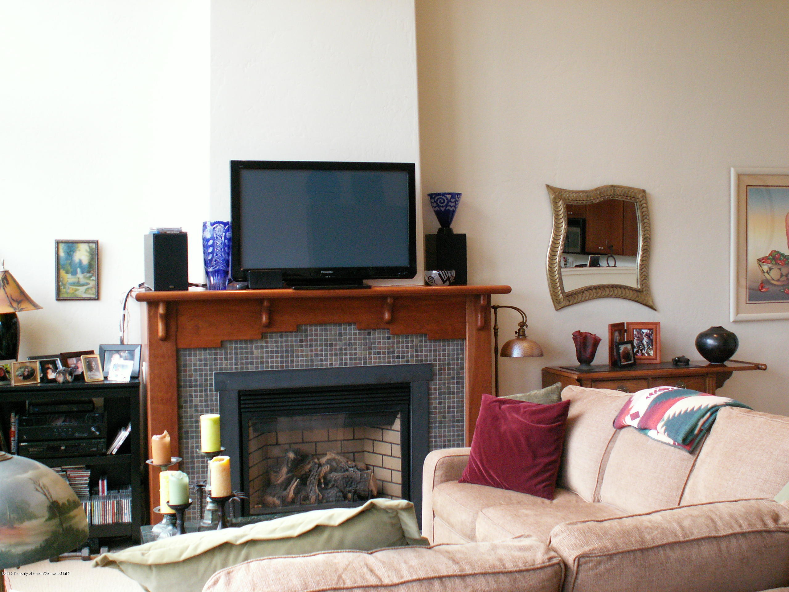 413 Jody Road Basalt, CO 81621 - Photo 5 of 10 a living room with furniture and a fireplace