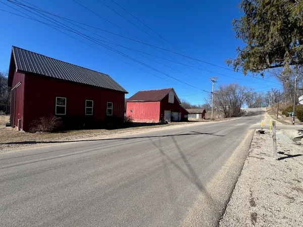 a view of a house with a street