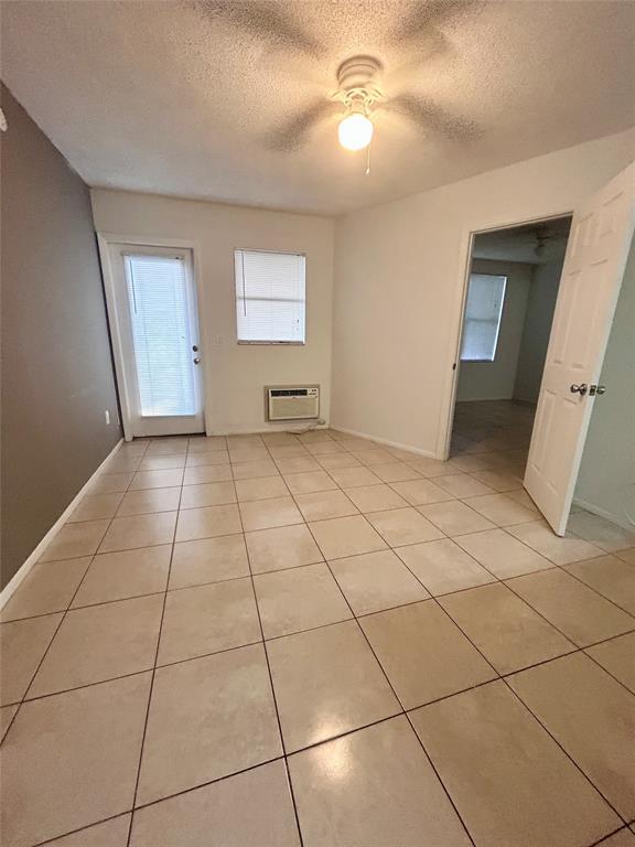 4481 West McNab Road, Unit 26 Pompano Beach, FL 33069 - Photo 11 of 13 a view of an empty room with a window