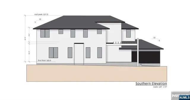 a black and white photo of a black white house