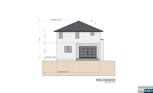 a black and white photo of a living room