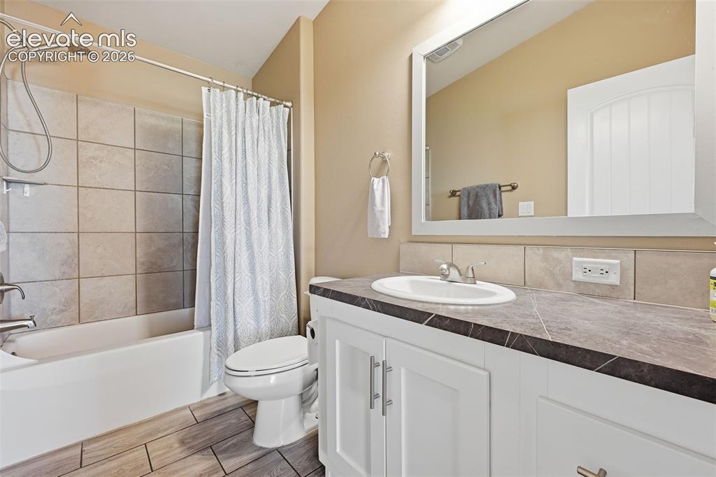 23335 Sanborn Road Calhan, CO 80808 - Photo 17 of 28 Full main level bathroom