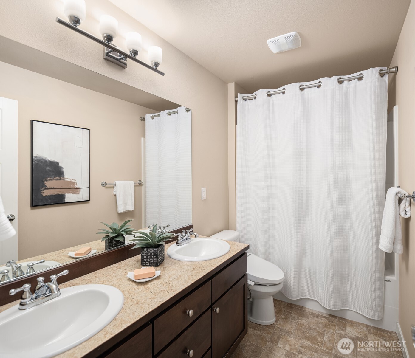 6509 128th Place Southwest Edmonds, WA 98026 - Photo 26 of 28 a bathroom with a double vanity sink toilet and a mirror
