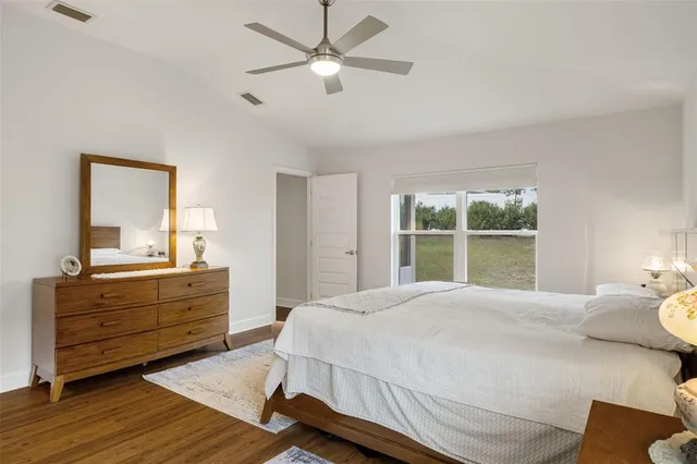 a bathroom with a shower a toilet and a sink